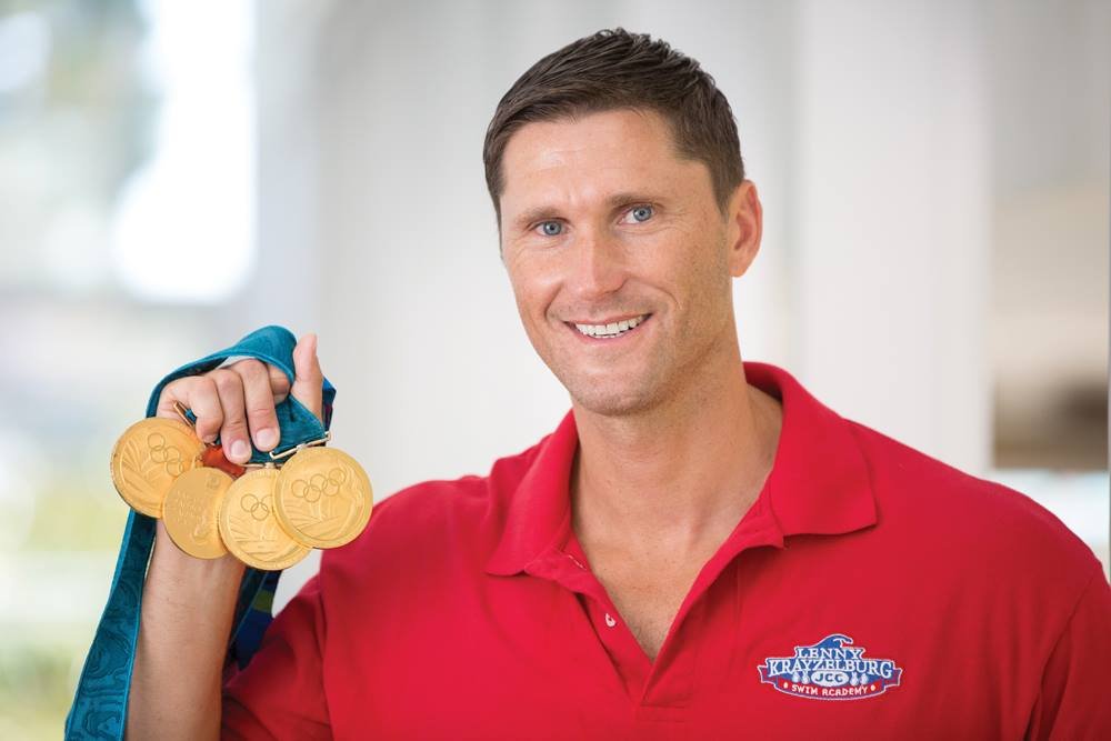 SwimRight Academy founder with Olympic medals